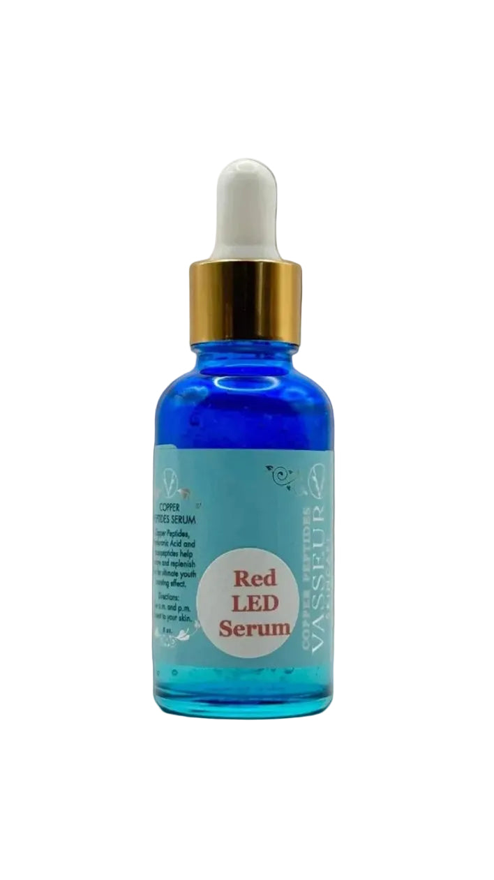 Blue serum bottle with dropper labeled 'Red LED Serum' on a white background
